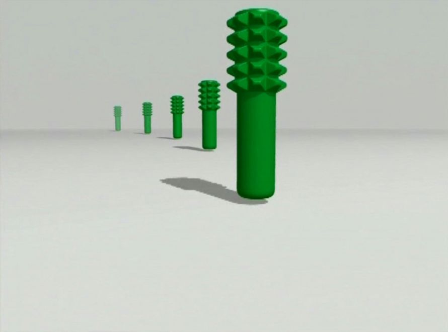 Edition von Ayse Erkmen. Still von einem Bildschirm. Animierte grüne Landminen hüpfen in einer Reihe von hinten nach vorne vor weißem Hintergrund.