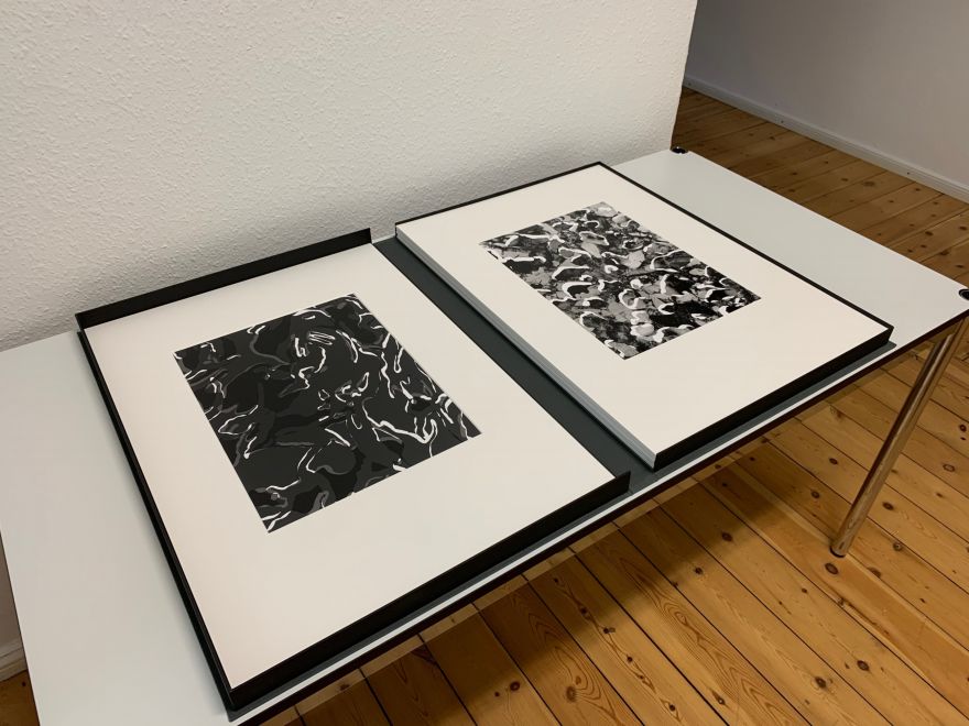 Photogramms are mounted into Passepartouts and lie in a linen cassette