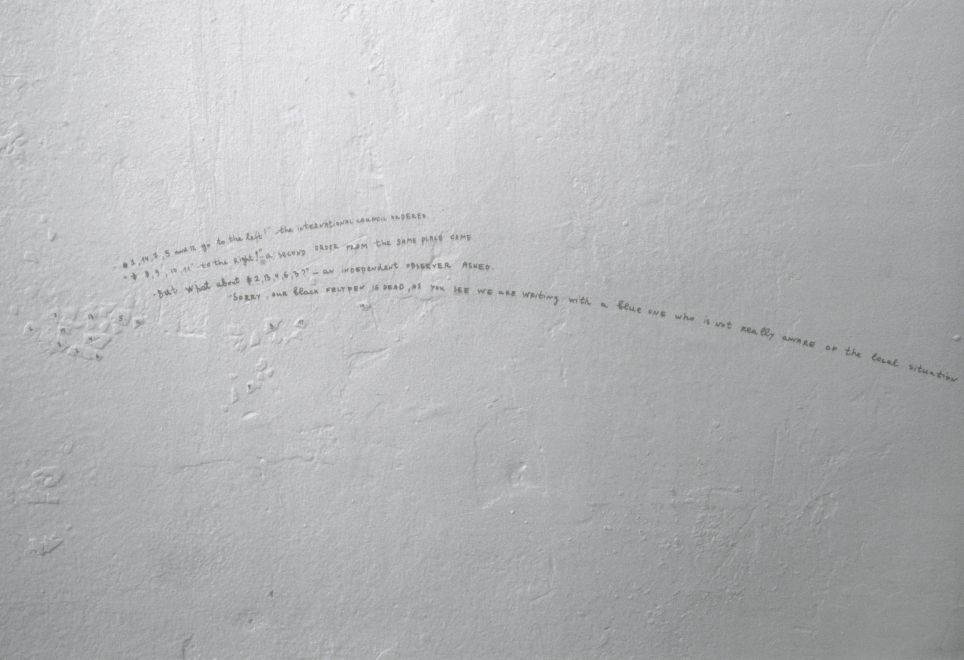 Ink on offset print by Nedko Solakov. A photo of a plastered wall with irregularities numbered in ink. A text with the numbers was written small on the wall. For example: “#1, 14, 7, 5 and 12 go to the left!” the international council ordered