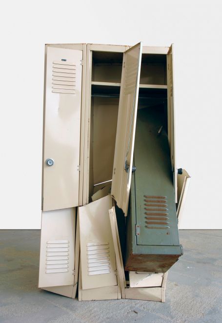 Edition by Olaf Metzel. Beige and olive green metal locker, destroyed and reassembled with an angle grinder. The object is reminiscent of cubist compositions