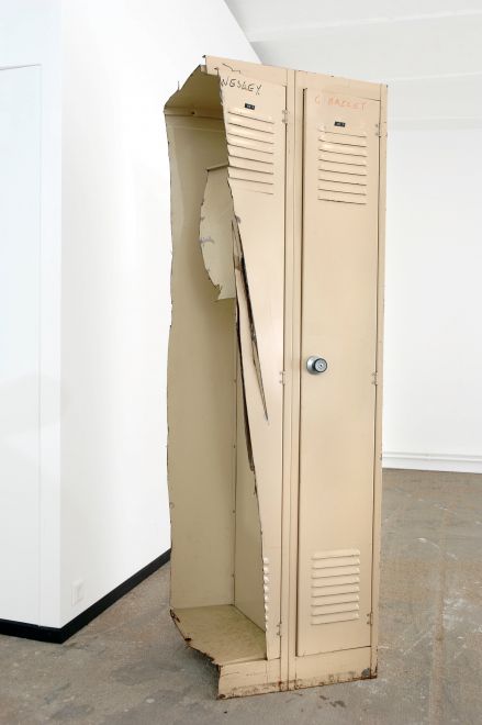 Edition by Olaf Metzel. Beige metal locker, destroyed with an angle grinder. The object is reminiscent of cubist compositions